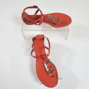Coach Women’s Sandals Size 7B Orange Patent Leather T-Strap Flat Gold Logo